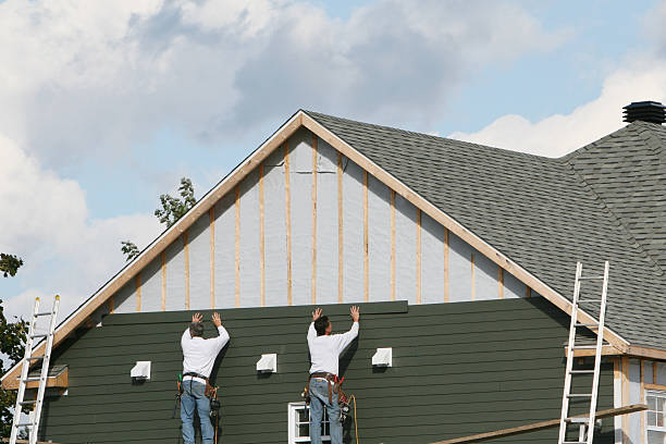 Professional Emergency Siding Repair technician working in Iron Station, NC